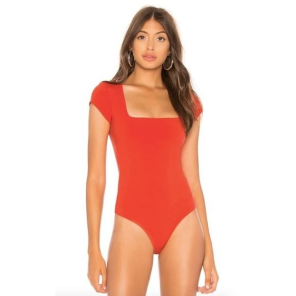 Free People Tops - Free People body suit. Brand new. Very flattering